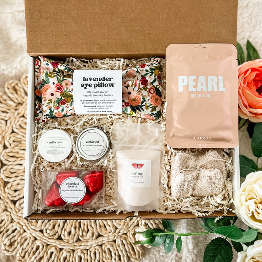 You Are Loved Care Package For Her - Spa Gift Box For Women. Includes a lavender eye pillow, sugar scrub, soy candle, chocolate hearts, self love bath, cozy socks and pearl facial mask.
