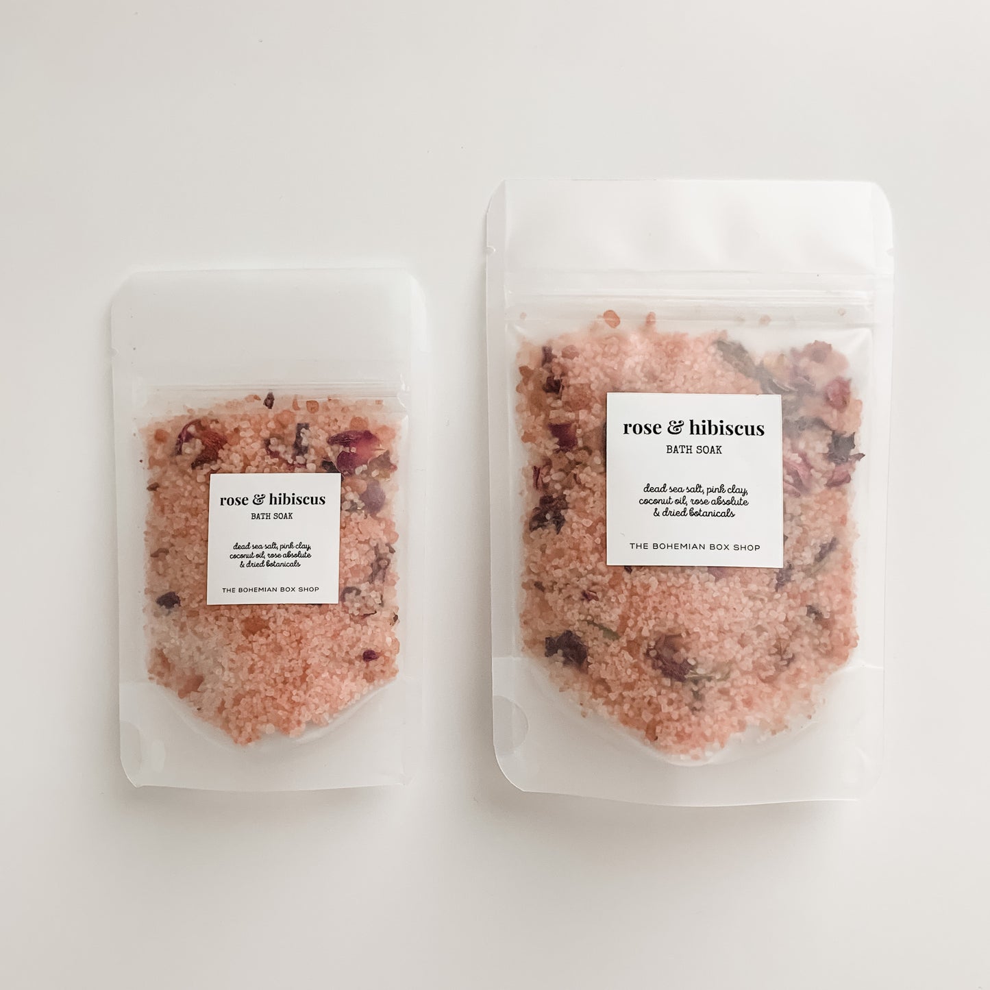 rose and hibiscus bath salts in 2oz and 4oz frosted packets