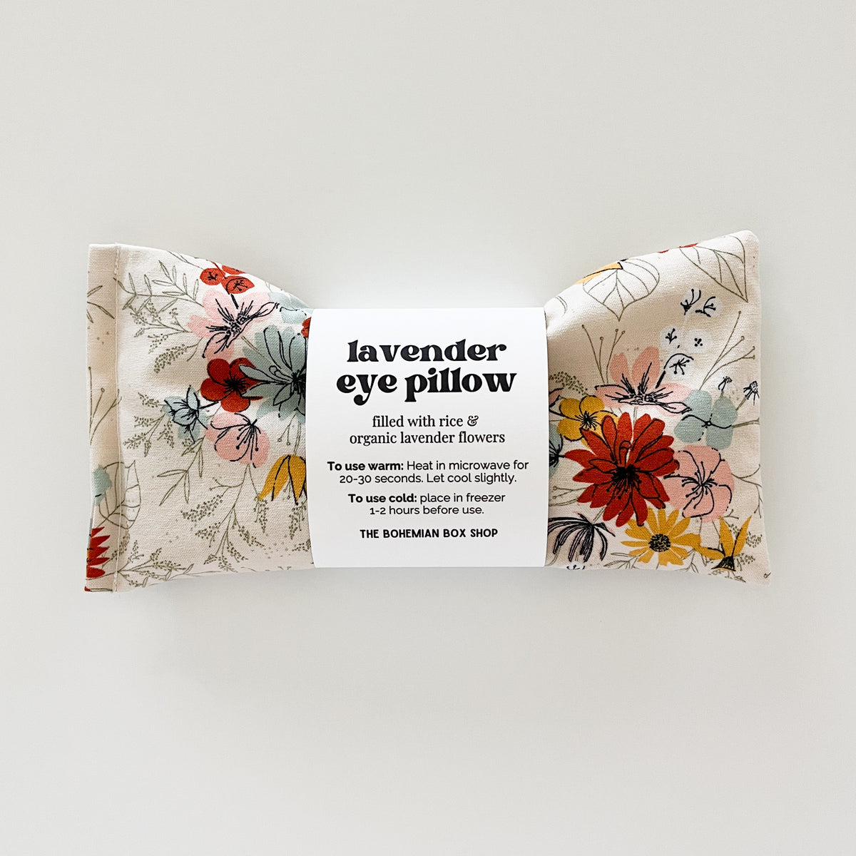 Ivory Lavender Eye Pillow with a floral pattern. Made by The Bohemian Box Shop