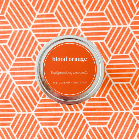 Blood Orange 4oz Tin Soy Candle with orange label 