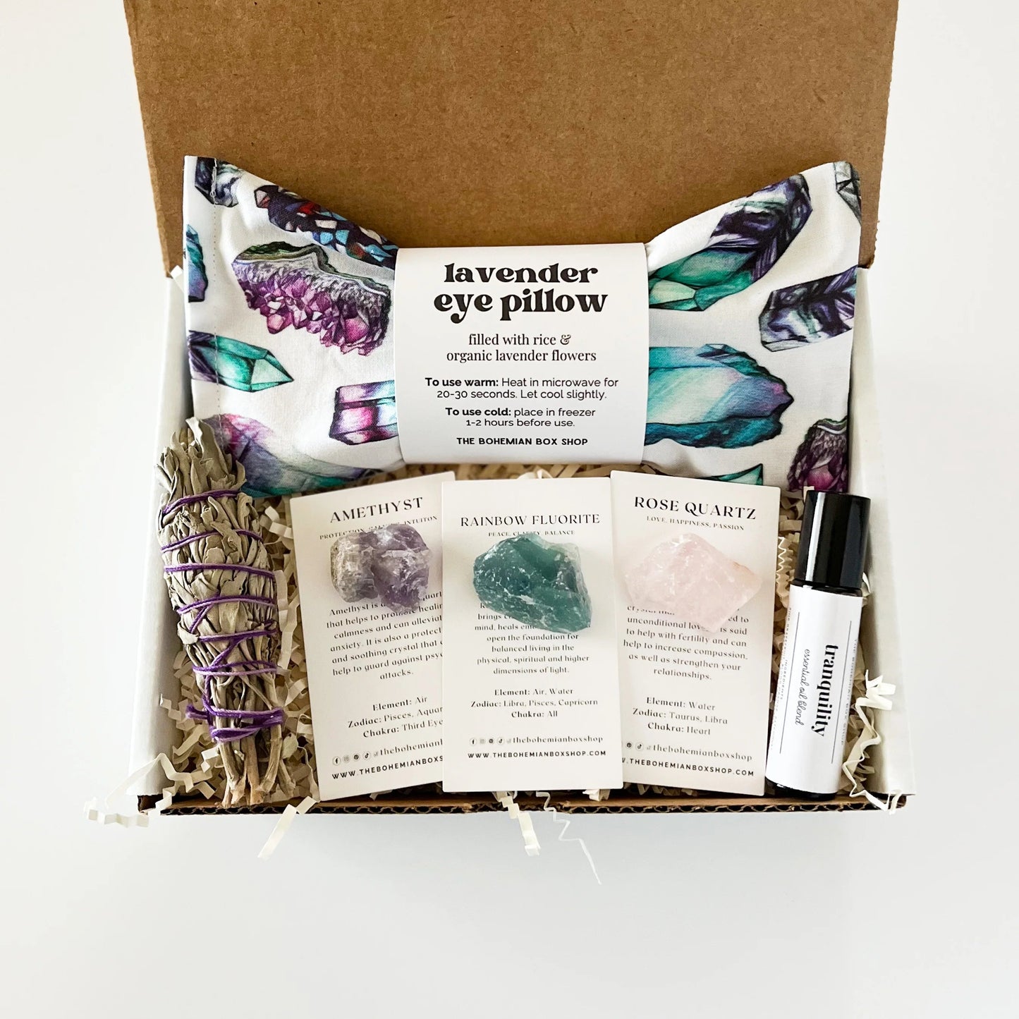 Tranquility and Relaxation Gift Box. Includes lavender eye pillow, mini sage bundle, crystals and tranquility essential oil bottle. 