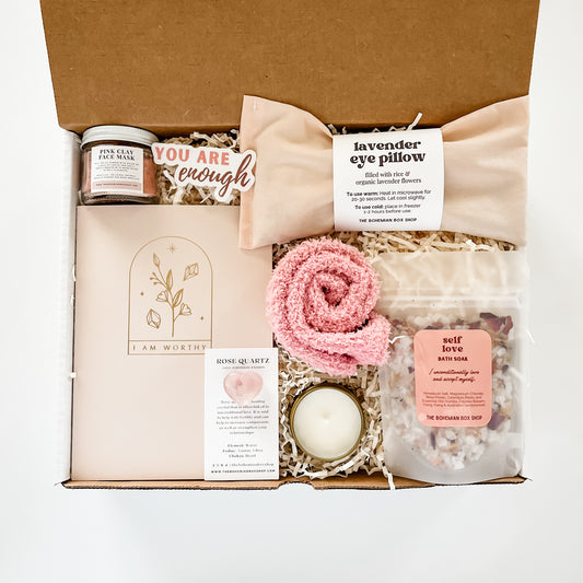 Self Love Care Package - I Am Worthy Gift Set. Includes pink clay facial mask you are enough vinyl sticker, I am worthy journey, rose quartz crystal, pink women’s socks, soy candle, lavender eye pillow, self-love bath soak with affirmation. ￼