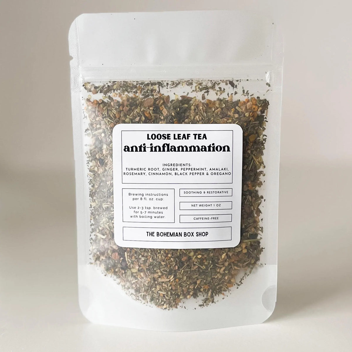 Loose leaf tea package labeled 'anti inflammation' from The Bohemian Box Shop on a neutral background