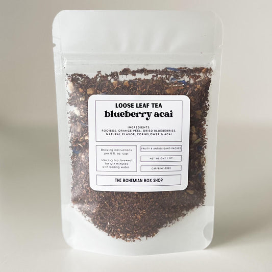 Loose leaf tea package labeled 'Blueberry Acai' from The Bohemian Box Shop on a white background