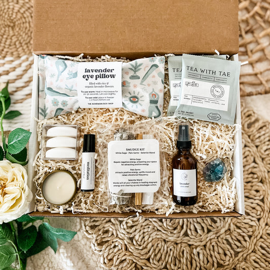 Yoga Gift Set Mindfulness Gift. Contains lavender eye pillow, shower steamers, soy candle, meditation essential oil roller bottle, smudge kit, lavender linen spray, rainbow fluorite crystal and tea packets. ￼