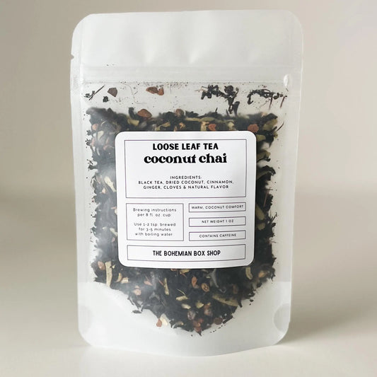 Loose leaf tea package labeled 'Coconut Chai' from The Bohemian Box Shop on a neutral background