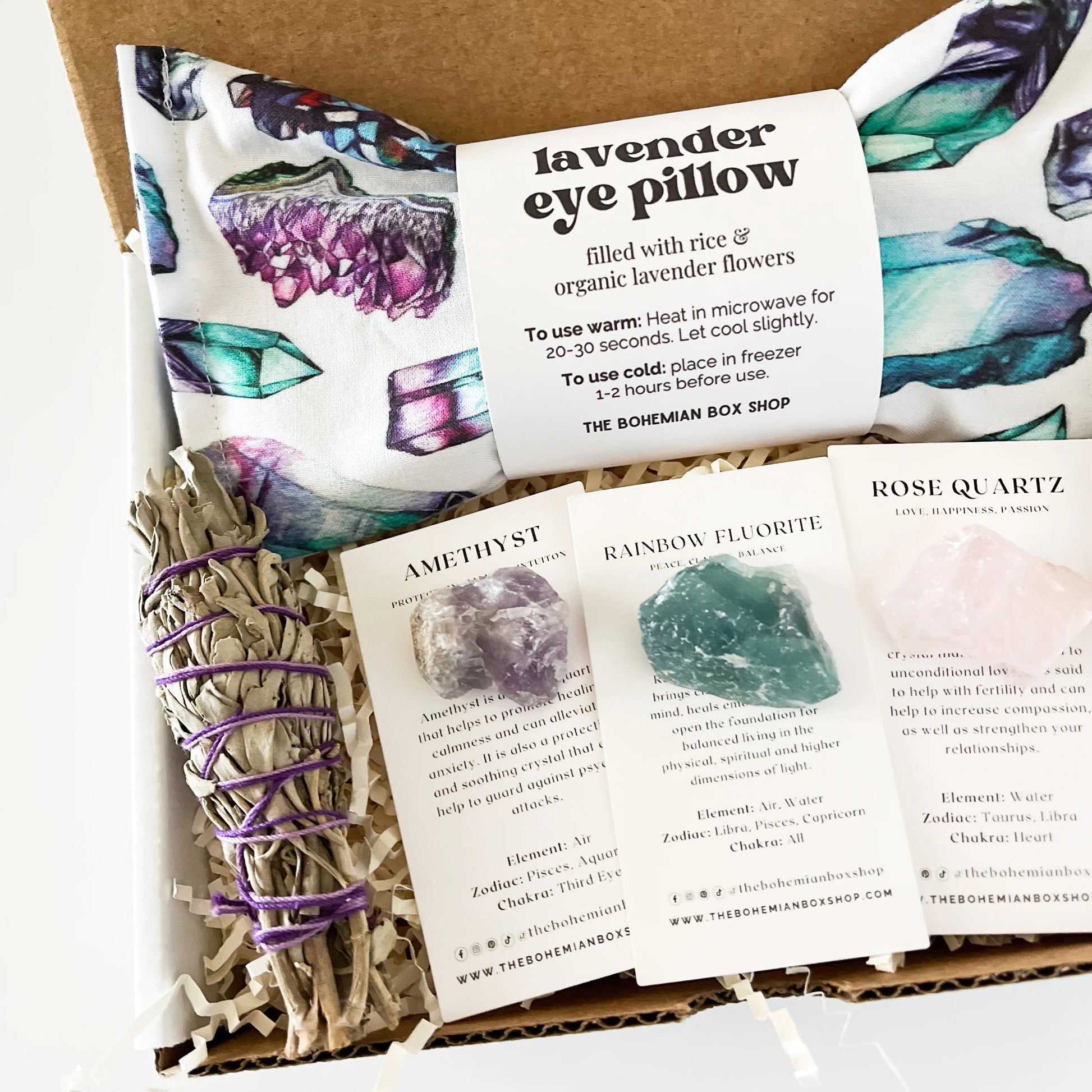 Tranquility and Relaxation Gift Box. Includes lavender eye pillow, mini sage bundle, crystals and tranquility essential oil bottle. 