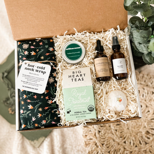 Spa gift set for women. Includes hot and cold neck wrap, big heart tea co Royal treatment tea, soy candle, eucalyptus mint body oil, lavender linen spray and orange blossom bath bomb. 