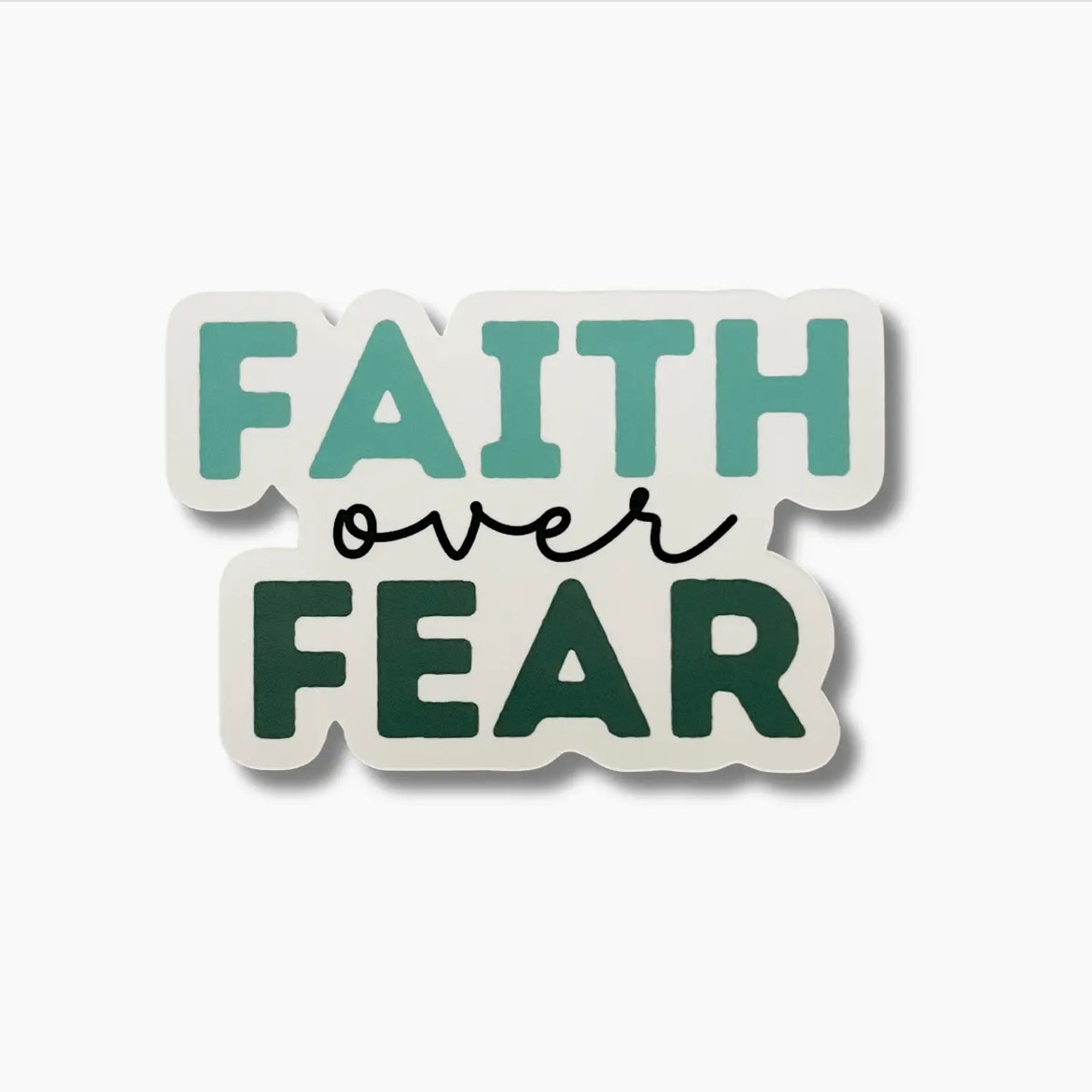 A vinyl sticker with the text 'Faith Over Fear' in a green color.
