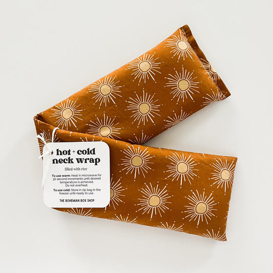 Hot and cold neck wrap with sun pattern on a white background