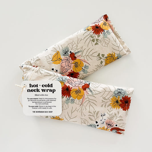 ivory floral hot and cold neck wrap made by The Bohemian Box Shop on a white background