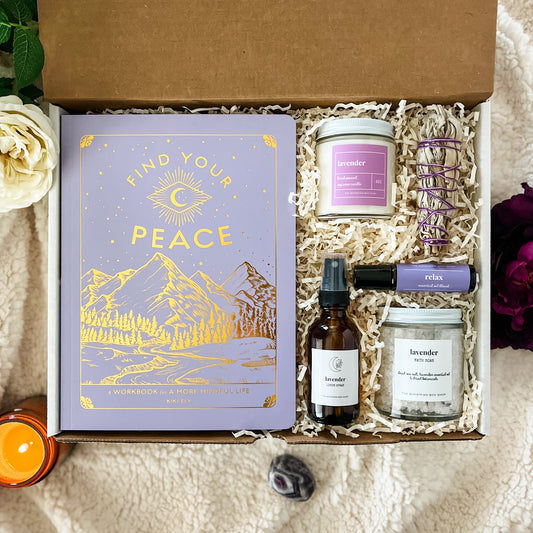 Find your peace mindfulness gift set. Includes find your peace book, lavender soy candle, lavender linen spray, minute relax essential roller bottle, bath soak, and mini sage bundle. 