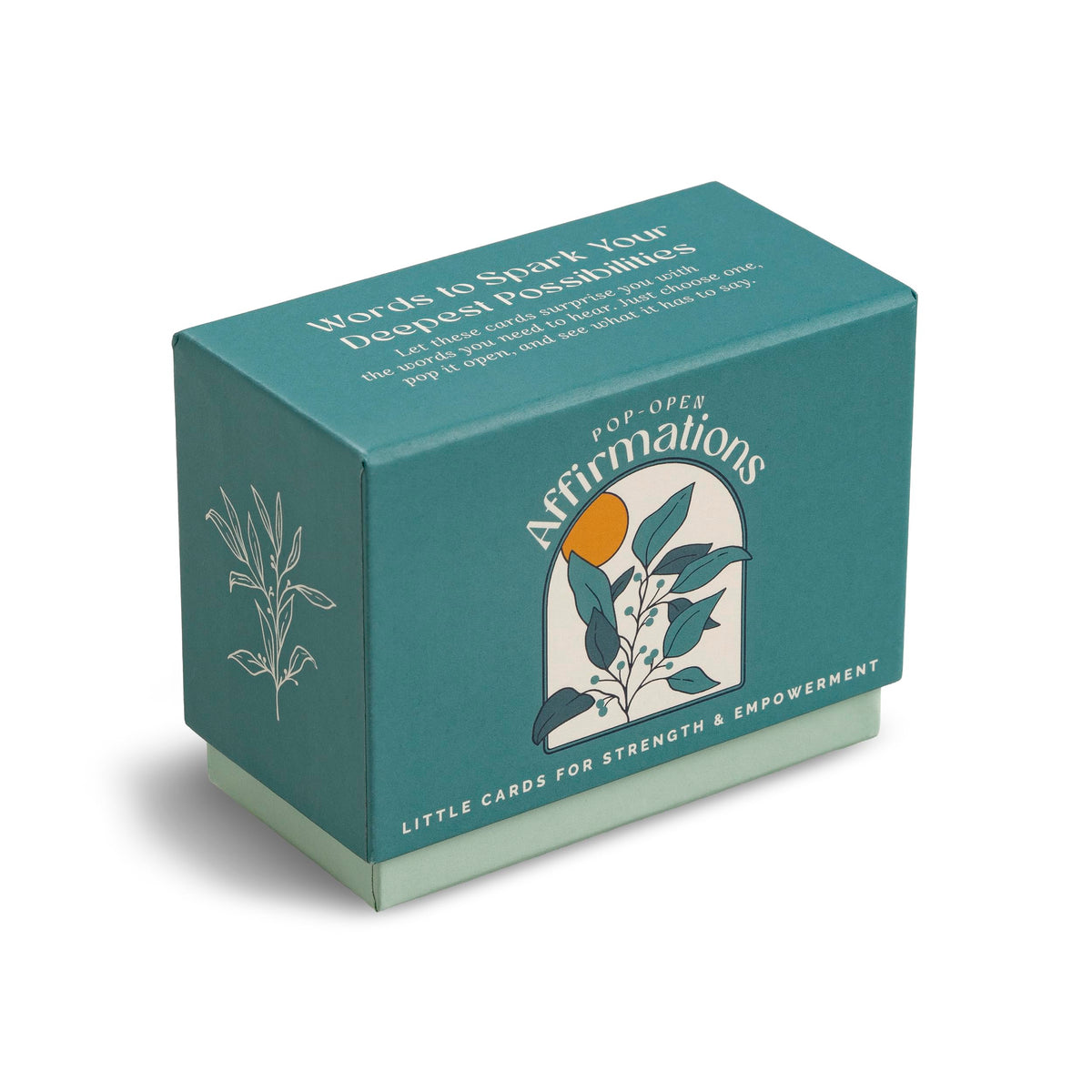 Teal box of affirmation cards with nature-themed design on a white background