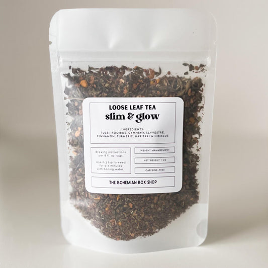 Loose leaf tea package with a label on a neutral background
