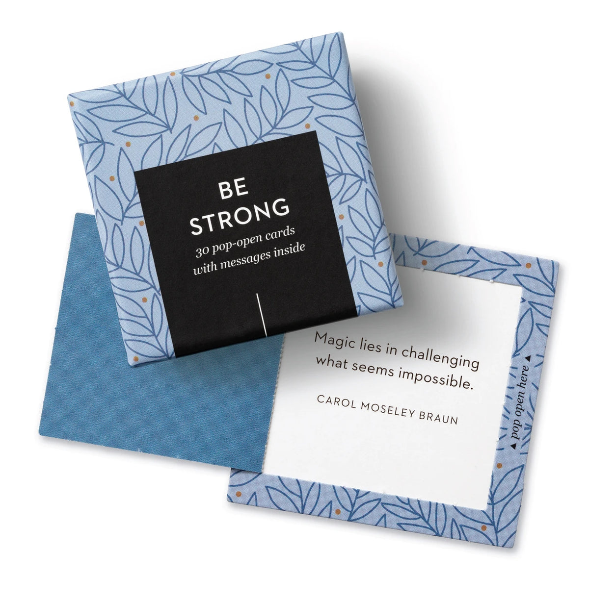 A boxed card set with a blue patterned outer box, a blue envelope, and an open white message card on a clean white background. The front of the box reads 'BE STRONG' and includes the text '30 pop-open cards with messages inside.