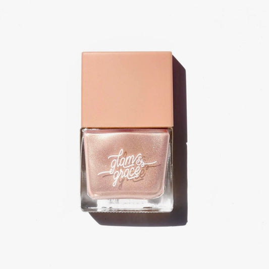 Pink nail polish bottle with 'glam & grace' text on a white background
