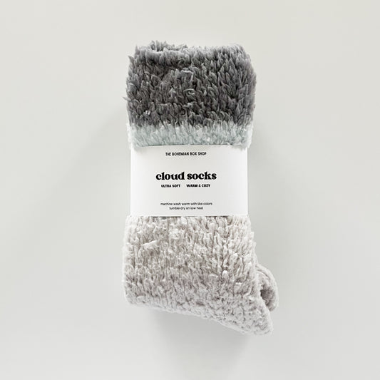 grey light blue and dark grey crew cloud socks on a white background