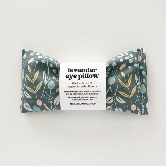 light green eye pillow with floral pattern