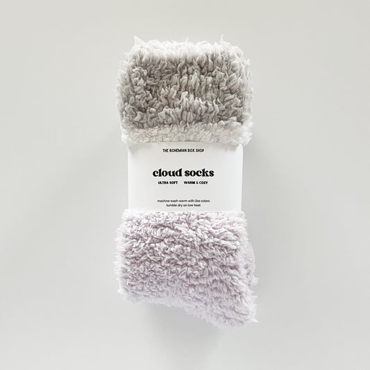 light grey and purple crew cloud socks on a white background