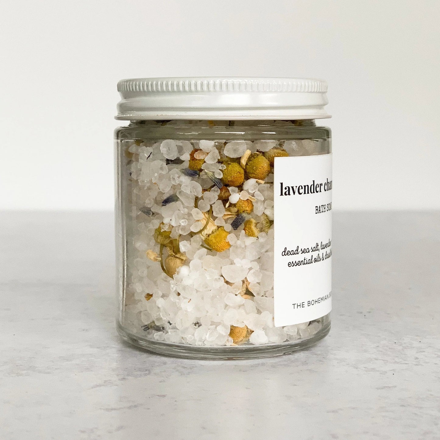 lavender chamomile bath soak in a clear jar with white lid