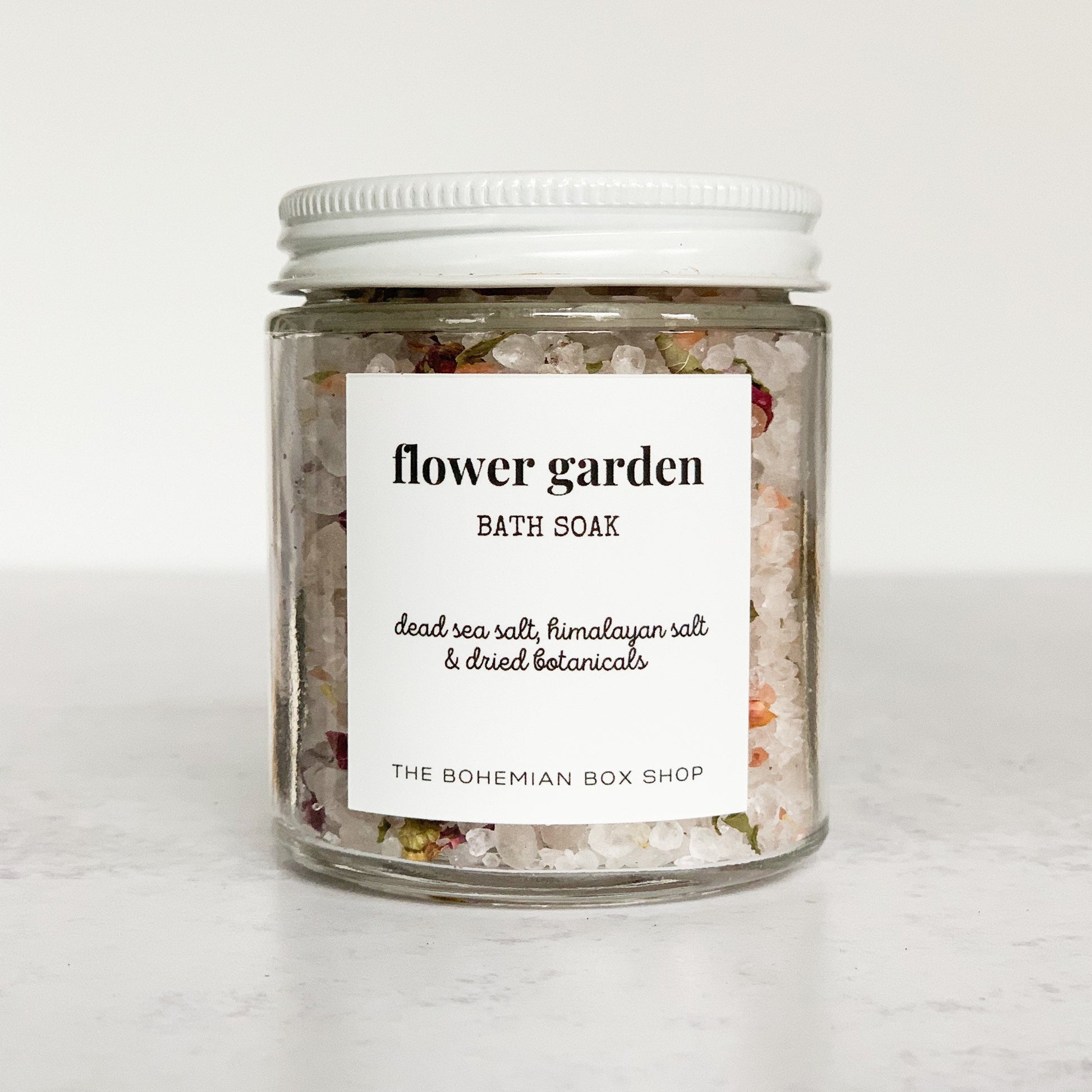flower garden bath soak in a clear jar with white lid