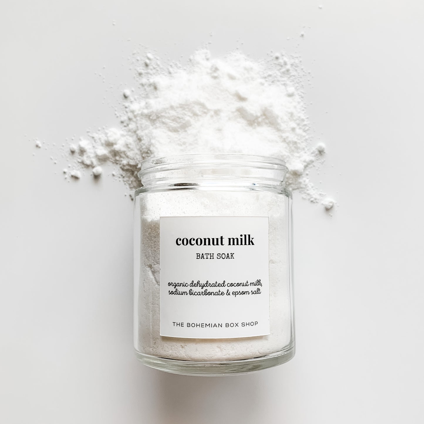 Coconut Milk Bath Soak in a clear jar with white label